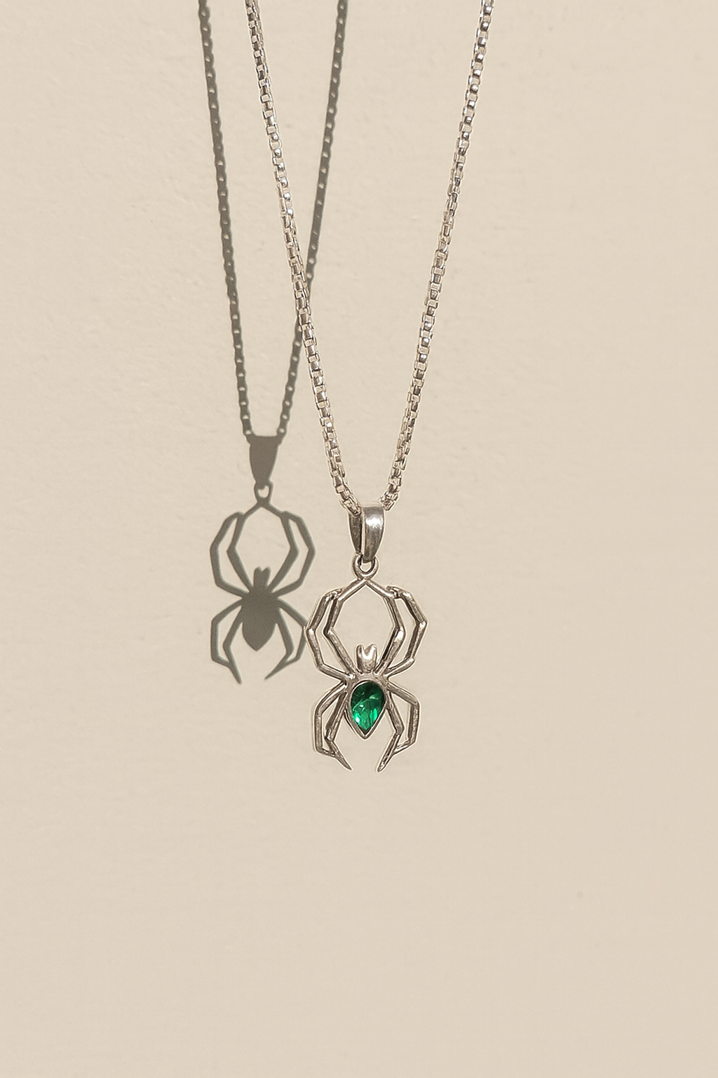 Gothic-inspired green gem spider necklace